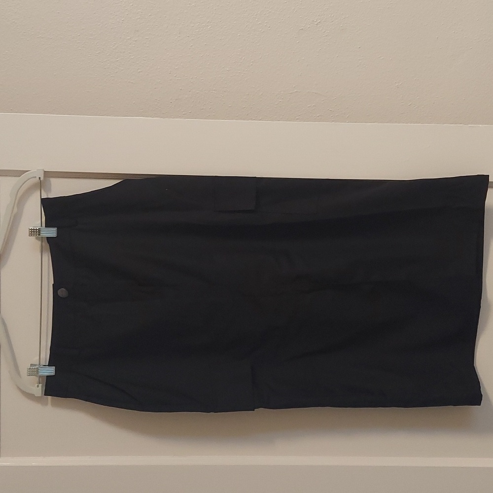 Black cargo skirt with pockets.